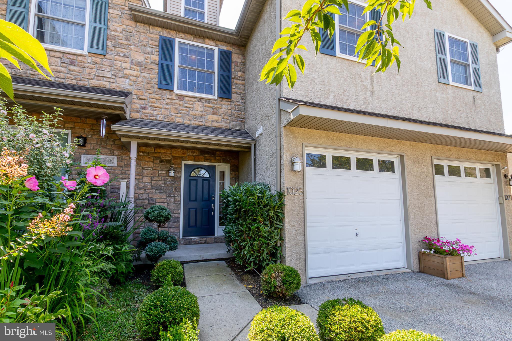 Welcome to 1025 Ford St, a beautifully maintained and constantly updated townhouse close to the KoP mall, Aldi, Trader Joes, Wegmans and more. Route 202, 76, 476 and the turnpike are a short drive away. On the first floor, recently refinished hardwood floors welcome you into a bright and updated kitchen with quartz countertops, custom backsplash, LED lighting and newer appliances. A conveniently placed, refreshed powder room is tucked away, next to a coat closet and newer in-ceiling LED lights lead the way past the gas fireplace to the sliding doors and out onto the newly rebuilt TREX deck, overlooking the private backyard. On the second floor, newly installed hardwood floors throughout lead the way to a hallway laundry area, recently updated with a countertop, cabinets, lighting and newer appliances. The first full bath boasts a large closet, shower/tub and vanity with updated fixtures and lighting. The second bedroom boasts new lighting, new ceiling fan and two, large closets. The primary bedroom welcomes you in with new lighting, a new ceiling fan, a custom walk-in closet and large, ensuite bathroom with plenty of countertop space, a large soaking tub and stall shower. The third floor loft has brand new carpeting, lighting, ceiling fan and has a large closet and the only townhouse of the group to boast front and rear dormer windows to let all the sunlight in and brighten the room. A fully finished basement with engineered flooring, new ceiling and lighting leads out onto the paver patio through sliding doors and into the privacy of the backyard. An attached, heated, single-car garage rounds out the property with LED lighting, beautiful professionally painted floors and an EV hookup. No HOA, no dues.