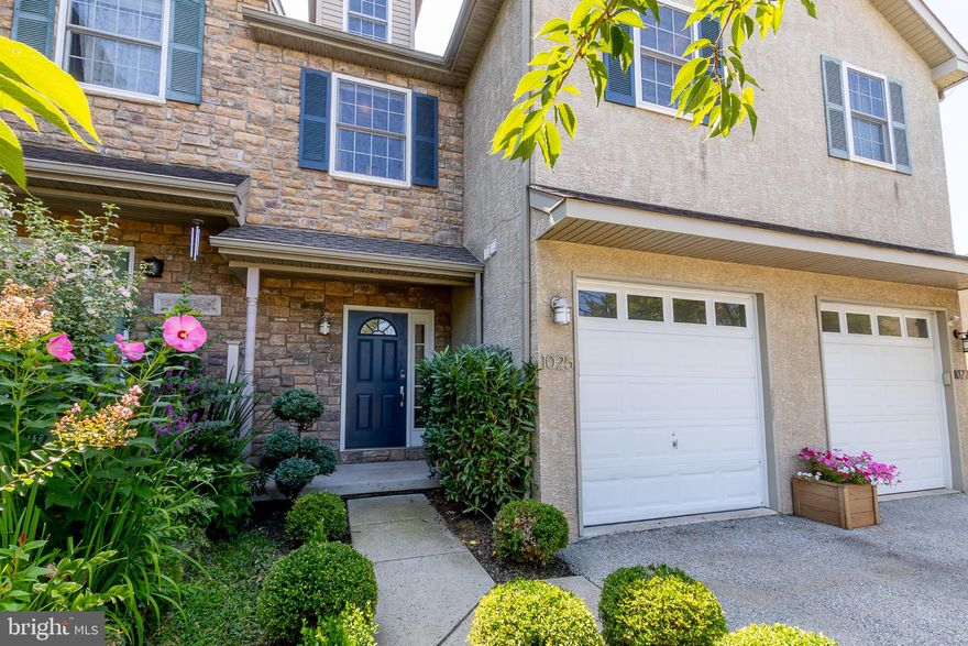 PRICE REDUCTION!!! Welcome to 1025 Ford St, a beautifully maintained and constantly updated townhouse close to the KoP mall, Aldi, Trader Joes, Wegmans and more. Route 202, 76, 476 and the turnpike are a short drive away. On the first floor, recently refinished hardwood floors welcome you into a bright and updated kitchen with quartz countertops, custom backsplash, LED lighting and newer appliances. A conveniently placed, refreshed powder room is tucked away, next to a coat closet and newer in-ceiling LED lights lead the way past the gas fireplace to the sliding doors and out onto the newly rebuilt TREX deck, overlooking the private backyard. On the second floor, newly installed hardwood floors throughout lead the way to a hallway laundry area, recently updated with a countertop, cabinets, lighting and newer appliances. The first full bath boasts a large closet, shower/tub and vanity with updated fixtures and lighting. The second bedroom boasts new lighting, new ceiling fan and two, large closets. The primary bedroom welcomes you in with new lighting, a new ceiling fan, a custom walk-in closet and large, ensuite bathroom with plenty of countertop space, a large soaking tub and stall shower. The third floor loft has brand new carpeting, lighting, ceiling fan and has a large closet and the only townhouse of the group to boast front and rear dormer windows to let all the sunlight in and brighten the room. A fully finished basement with engineered flooring, new ceiling and lighting leads out onto the paver patio through sliding doors and into the privacy of the backyard. An attached, heated, single-car garage rounds out the property with LED lighting, beautiful professionally painted floors and an EV hookup. No HOA, no dues.