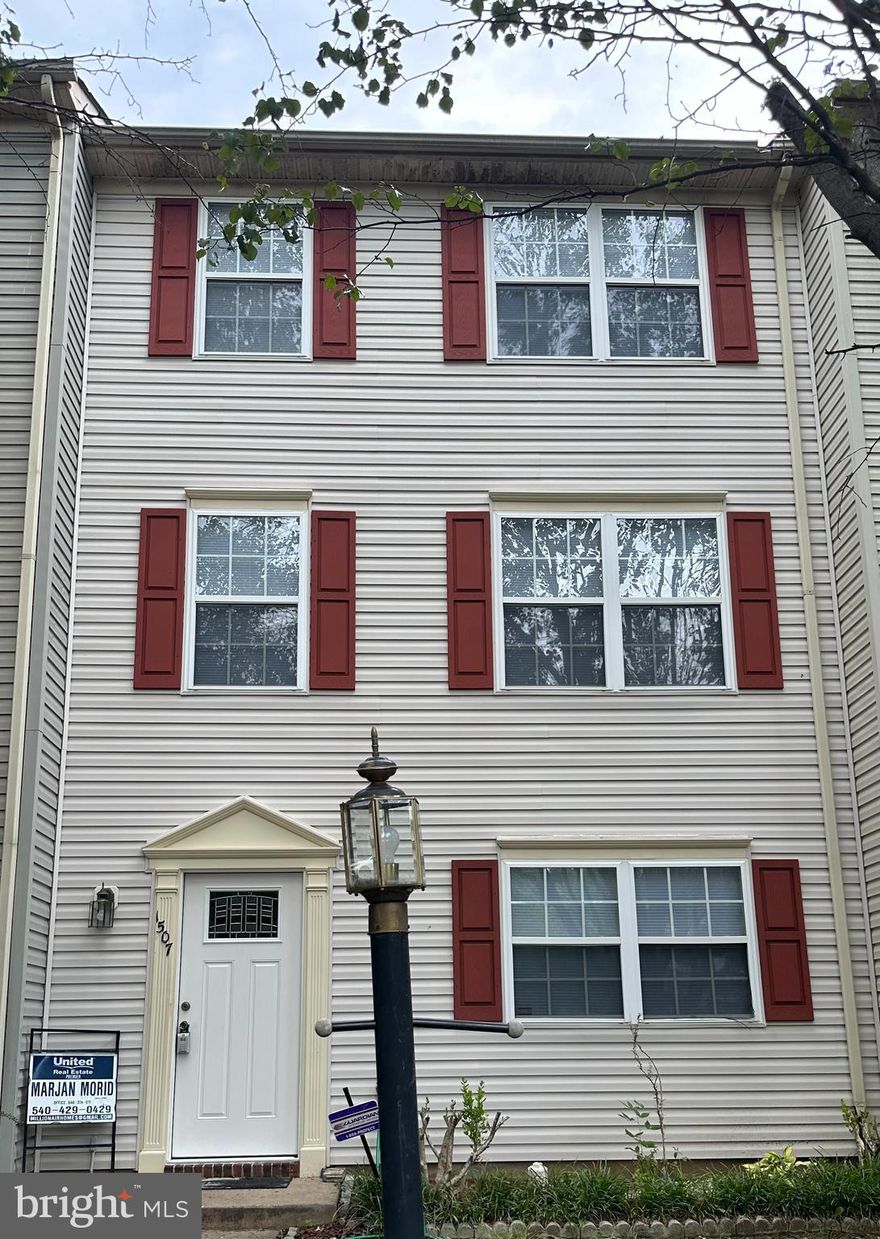 This residence is sure to capture your attention with its delightful features and convenient layout.
Upon entering, you'll be greeted by a family room that serves as the heart of the home. The room boasts a cozy gas fireplace, creating a warm and inviting atmosphere for relaxation and family gatherings.
The kitchen is a true highlight, featuring an island that adds both functionality and charm. The kitchen has been recently updated with brand new stainless steel appliances, giving it a modern and sophisticated touch. The waterproofed flooring offers peace of mind and durability, while the fresh paint and beautiful cabinets enhance the overall aesthetic appeal. From the kitchen, you can easily access the deck, providing an ideal space for outdoor dining and entertaining.
Adjacent to the kitchen, an open formal living room awaits, adorned with beautiful crown molding. This elegant space offers a seamless flow from the kitchen and is perfect for entertaining guests or simply enjoying moments of tranquility.
As you make your way upstairs, you'll find two bedrooms, providing comfortable and private retreats. These bedrooms are well-proportioned and offer versatility to suit your needs.
This property offers a wonderful combination of comfort, style, and practicality. This beautiful townhome is close to shops, restaurants, 95 and Route 1