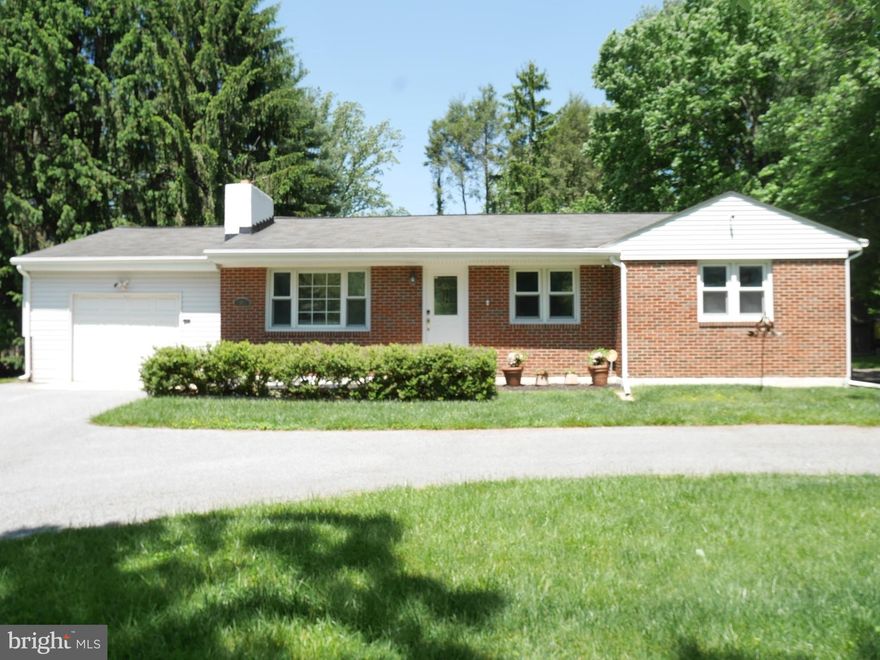 Welcome to this charming and beautifully maintained home in Randallstown. As you step inside, you are greeted by stunning hardwood floors that lead you into a spacious living room boasting a cozy wood-burning fireplace - perfect for those chilly nights. The kitchen features stainless steel appliances, storage pantry, luxury vinyl plank floors and ample counter space, making meal prep a breeze.

This home boasts three bedrooms, and two full bathrooms. Need a dedicated workspace? Look no further than the office den, ideal for remote work or studying with a cedar storage closet. The finished basement offers additional living space, perfect for a game room or movie night.

Enjoy the convenience of an attached garage, keeping your car safe from the elements with additional storage space. Plus a three-car separate garage with heat for all your vehicles and projects. The property also features a chicken coop for those looking to embrace farm-to-table living, as well as a  fenced in garden space and two storage sheds for all your outdoor equipment needs. With a large driveway and deck perfect for entertaining or simply enjoying the serene surroundings, this home truly has it all.

Don't miss out on this wonderful opportunity to make this house your new home! Schedule your private showing today.