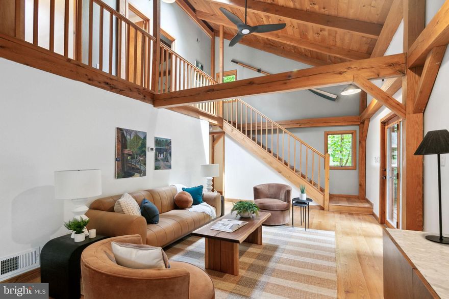 DEADLINE FOR OFFERS Wednesday, August 7th at 10a.

Nestled among trees and overlooking Sligo Creek, this extraordinary Takoma Park home offers uninterrupted views of the forest and park from all three levels. The post-and-beam style residence, a personal project of a local architect, features a stunning interior reminiscent of a New England cabin, creating a sense of escape just 30 minutes from downtown Washington, DC.

Accessible from Hayward Ct or Colby Ave, you can either climb stairs through lush, forested grounds or arrive at the large, flat parking area, yard, and expansive deck. Once inside, the main level impresses with its vaulted ceiling and oversized windows that flood the space with natural light and stunning views. The kitchen is a culinary delight with its large island, quartz countertops, bespoke cabinets, and glass tile backsplash. Enjoy a meal in the dining room with spectacular views, or for an even better view, off the living room is a covered porch with skylights. Dine Alfresco and submerge yourself in the tree canopy that makes you feel like you’re in your own private treehouse. For convenience and flexibility, there is a main-level bedroom that is currently being used as an office, a tiled mudroom with a full bathroom, and laundry off the kitchen.

On the upper level, the bright and airy primary suite is the perfect place to unwind. It boasts an office or seating area, a large walk-in closet, and a gorgeous ensuite bath with a skylight and high-end finishes. This floor also includes two additional well-sized bedrooms, each with ample closet space, and an updated hall bath.

The light-filled lower level features an inviting entry foyer that leads to a large room, which can serve as a bedroom, entertainment area, or office. On the opposite side, you'll find a versatile space offering numerous possibilities to suit your lifestyle, including the potential for an additional sixth bedroom, a workshop, a gym, or more. It’s fully above grade on two sides and accessible both from inside the house and via a separate entrance on Hayward Court. With a full bathroom, this layout provides the flexibility to create a separate in-law suite or studio, depending on your needs.

This exceptionally unique home combines seclusion with convenience, offering a private retreat that’s still close to everything you need! Takoma Park is a vibrant small town with a ton to offer. Top restaurants like Cielo Rojo, Seoul Food DC, Motorcat, and The Girl and the Vine are area favorites. The Co-Op and Soko, a butcher shop, are an easy walk for grabbing groceries. Coffee shops like Takoma Beverage Company and Koma are also nearby, as are fabulous retailers like People’s Books and Indigro Plants. To get to DC, hop on the Red Line Metro from downtown Takoma Park to DC.