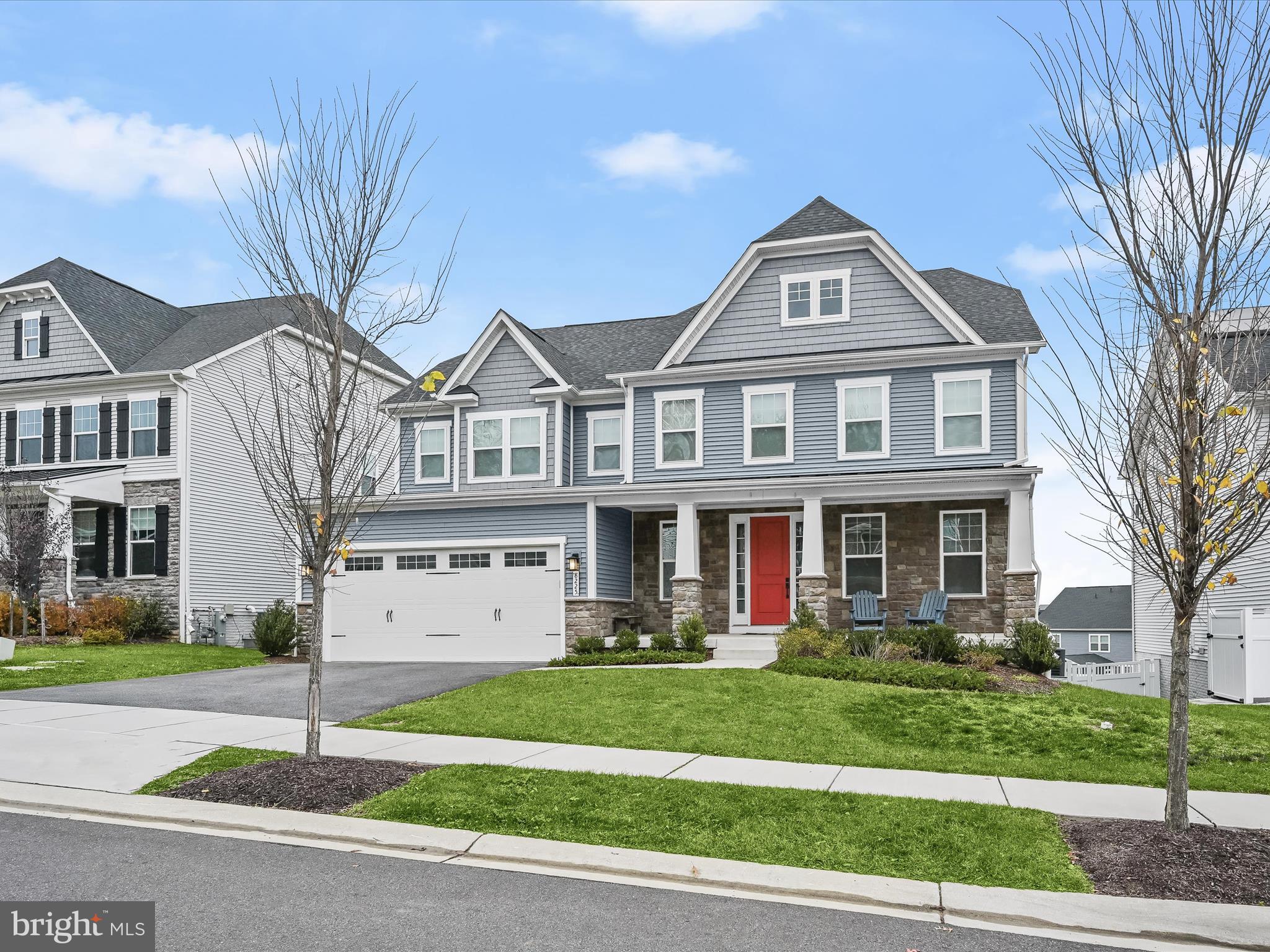 ***Multiple offers received. The offer deadline is Monday, December 9th, at 3pm.***Welcome home to 8225 Gunnar Drive in highly sought after Maple Lawn South! This exquisite luxury property is located in the heart of the neighborhood and backs to a serene open space. Built in 2020, this Longwood Model is a true gem boasting four bedrooms, four and a half bathrooms and an impressive 5,293 square feet of living space. The main level features wide plank luxury vinyl flooring throughout, an inviting gas fireplace and a welcome center which leads to the private study.
The designer kitchen is a chef’s dream featuring white shaker-style cabinetry, a tasteful contrasting light grey island, quartz countertops, a double oven and a five-burner cooktop. The herringbone pattern backsplash adds the perfect finishing touch. The covered porch, just off the living room, is a favorite gathering spot and a highlight of the main level.
The expansive backyard is fully fenced with white vinyl privacy fencing providing ample space for relaxation and entertainment. Upstairs, four spacious bedrooms and three bathrooms await, with more luxury vinyl plank flooring in the upstairs landing areas and plush carpet in all bedrooms. The primary bedroom features two large walk-in closets while the primary bathroom boasts a dual sink vanity, a frameless glass shower stall, and a large garden tub.
The secondary bedrooms all offer either an en suite bath or a buddy bath with dark espresso colored cabinetry. The lower level provides another relaxing retreat featuring a spacious storage room that could be converted to a fifth bedroom or a gym, a full bathroom and a large bar with quartz countertops. The double doors lead to the spacious and private backyard. Conveniently located near major commuter routes, surrounded by fantastic shops and restaurants, and featuring an enviable community pool and playground, the Maple Lawn communities are the premier choice in Howard County. Come experience the luxury and charm of this exquisite property for yourself!