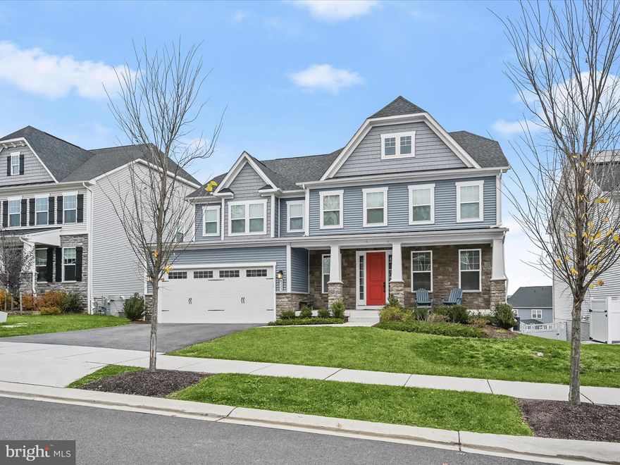 ***Multiple offers received. The offer deadline is Monday, December 9th, at 3pm.***Welcome home to 8225 Gunnar Drive in highly sought after Maple Lawn South! This exquisite luxury property is located in the heart of the neighborhood and backs to a serene open space. Built in 2020, this Longwood Model is a true gem boasting four bedrooms, four and a half bathrooms and an impressive 5,293 square feet of living space. The main level features wide plank luxury vinyl flooring throughout, an inviting gas fireplace and a welcome center which leads to the private study.

The designer kitchen is a chef’s dream featuring white shaker-style cabinetry, a tasteful contrasting light grey island, quartz countertops, a double oven and a five-burner cooktop. The herringbone pattern backsplash adds the perfect finishing touch. The covered porch, just off the living room, is a favorite gathering spot and a highlight of the main level. 

The expansive backyard is fully fenced with white vinyl privacy fencing providing ample space for relaxation and entertainment. Upstairs, four spacious bedrooms and three bathrooms await, with more luxury vinyl plank flooring in the upstairs landing areas and plush carpet in all bedrooms. The primary bedroom features two large walk-in closets while the primary bathroom boasts a dual sink vanity, a frameless glass shower stall, and a large garden tub.

The secondary bedrooms all offer either an en suite bath or a buddy bath with dark espresso colored cabinetry. The lower level provides another relaxing retreat featuring a spacious storage room that could be converted to a fifth bedroom or a gym, a full bathroom and a large bar with quartz countertops. The double doors lead to the spacious and private backyard. Conveniently located near major commuter routes, surrounded by fantastic shops and restaurants, and featuring an enviable community pool and playground, the Maple Lawn communities are the premier choice in Howard County. Come experience the luxury and charm of this exquisite property for yourself!