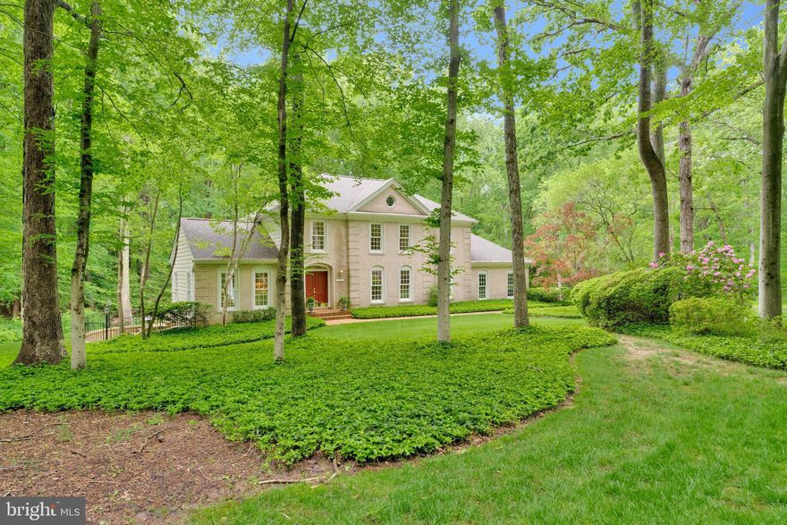 Canterberry Estates - a community unto its own.  And this exceptional home sits on a private 2-acre lot that will have you wishing you would never have to leave it.  The setting is so tranquil and serene, three couples chose it as the site for their weddings!  .  .  .  .  .  .  .  .  .  .

A river runs through it.  Well, not exactly a river - but you do have your own stream to enjoy while relaxing on your back deck or in the gazebo and connecting with the abundance of wildlife that frequently visits - deer (of course), hawks, fox, turtles, turkeys, the occasional heron, and Mrs. O'Reilly's cat, to name a few.  .  .  .  .  .  .  .  .  .

Oh, and did we mention that there is a spectacular home that comes with this spectacular property? Traditionally presented, enter the foyer to view the living room (left] and dining room (right) . . . table for 12 anyone?  Next is the family room, almost sitting in the gorgeous outdoors and featuring a floor-to-vaulted-ceiling stone fireplace with slate hearthstone, built-in shelving by its side that includes a mini wet bar.  .  .  .  .  .  .  .  .  .  .

The updated, upgraded reimagined kitchen includes new granite counter tops (2024), GE Profile appliances - Refrigerator (2025), island Cooktop (2024), Dishwasher (2024) and Double Oven with Microwave.  There is a large breakfast (or lunch, or dinner) eating area as well as counter seating for two.  .  .  .  .  .  .  .  .  .  .

The primary suite is a haven in itself featuring a  double-door entry into an ultra-spacious 270 square foot bedroom.  (That's how big our entire cabin was on the last cruise we took!)  PLUS another 100 square feet of romance space highlighted by the wood-burning fireplace.  And don't miss the totally renovated primary bath and closet/dressing area.  Jetted tub, separate shower with triple massage heads, granite-topped double sinks, heated floors, and a master crafted, custom built closet creation.  But wait, there's more!   3 other bedrooms with yet another completely remodeled bathroom with granite-topped double sinks and custom built vanity.  .  .  .  .  .  .  .  .  .

If you are into entertaining, or like to entertain yourself, welcome to the lower level.  The home theater area has all the audio / video essentials you need  - TV, DVD, CD, ABC  - all of which are included. The foremost feature is the custom crafted "social center."  This professionally designed gathering site invites  everyone - young and old(er) - to let loose and share stories, memories, tales, adventures.  It's equipped with refrigerator, ice-maker, dishwasher, microwave, and wine cooler.  Let the good times roll.  .  .  .  .  .  .  .  .  .