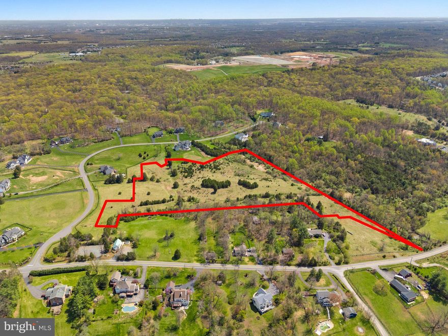 **Premier Estate Lot in Prestigious Leesburg Enclave**

Presenting a rare and exceptional opportunity to own a grand estate lot in one of Leesburg’s most distinguished neighborhoods, surrounded by exquisite residences valued in the millions. Set amidst rolling hills and tranquil landscapes, this expansive homesite offers the perfect backdrop to craft a bespoke luxury residence tailored to your vision.

Perfectly positioned for both privacy and convenience, the property enjoys immediate access to the Greenway with *no stoplights* between the homesite and Washington, D.C.—a truly remarkable advantage for commuters. Just minutes away lies the historic heart of downtown Leesburg, where upscale shopping, fine dining, and everyday conveniences like Wegmans await. For travelers, Dulles International Airport is a swift 20-minute drive.

The property offers the benefits of fully paved road access and is served by high-speed internet—ideal for today’s connected lifestyle. A certified drainfield has been approved, and public water access is available, ensuring a smooth path to development. This unique parcel is not subdividable, preserving the integrity and exclusivity of the estate setting.

Truly a once-in-a-lifetime opportunity, this exceptional lot represents the perfect union of elegance, location, and lifestyle.