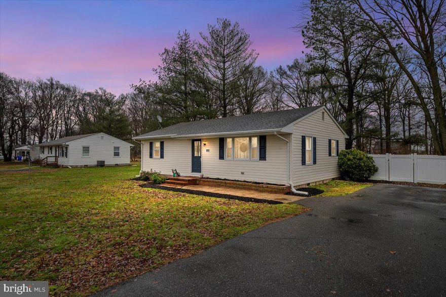 STUNNING and MOVE IN READY! Fully Renovated in 2017 and Freshly UPDATED this Queenstown single story 3 Bedroom Home is sure to Please!  Perfectly perched on just over a Half Acre with a HUGE Backyard and a NEW Vinyl Privacy  Fence! This is Perfect for the First-time Home Buyer or Downsizing Home Buyer... low maintenance, Adorable and very Easy to ENJOY!!  Brand New neutral Carpet in Bedrooms, gleaming Hardwood Floors throughout main living area and a Lovely Kitchen complete with Ceramic Tile Floors, Subway Tile Backsplash with gorgeous Granite Countertops, SS Appliances and a Breakfast Bar! Enjoy many gatherings on the rear Custom Stone Patio, BBQ fun with the Stone Custom Grill surround and Cozy  up next to the Custom Built Fire-Pit... it is truly a backyard PARADISE!! Beautiful Landscaping.. even in the Winter.. just wait for the Spring when everything blooms through those freshly mulched Garden beds! This is not in the Township of Queenstown so LOW taxes and No HOA restrictions! Easy commute to Delaware, the Beaches, Easton, Kent Island, Annapolis, Baltimore and DC! Priced Right and Ready for her new owner!!