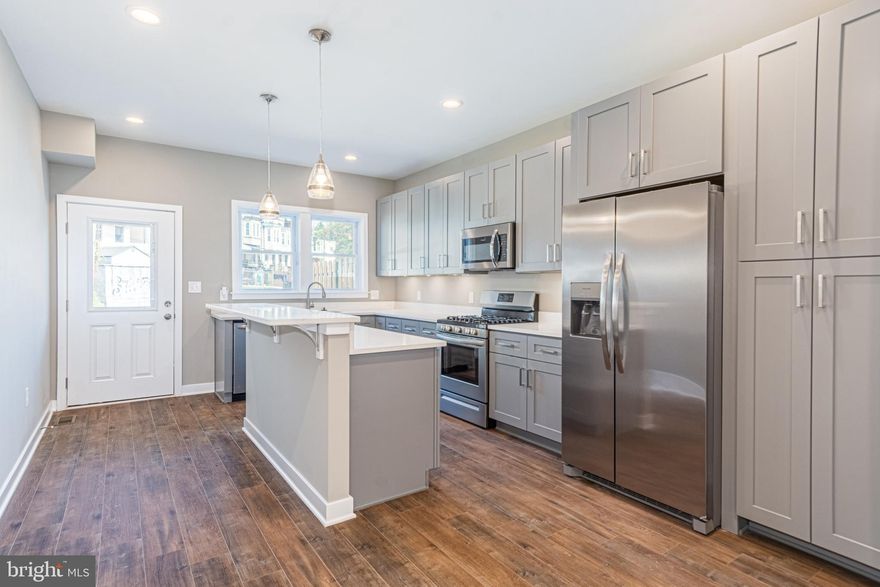 INTRODUCING UPTON GATEWAY - MAKE HOME OWNERSHIP A REALITY! 38 LUXURY RENOVATIONS WITH TONS OF BUYING INCENTIVES THAT MAKE OWNING A HOME MORE AFFORDABLE THAN RENTING! Standard features include 3 finished levels, wood floors throughout the main level and hallways, carpet in bedrooms, kitchens with 42" cabinets, Frigidaire ss appliance package, and granite counters. Main level with an open floor plan featuring a spacious living room, separate dining area, and kitchen, upper level Primary bedroom suite with full bath and walk-in closet and a 2nd bedroom with a hall bath and bedroom level laundry, 3rd level with 3rd bedroom and a family room, and 2 car off street parking! Tons of buying incentives including 10K Vacants to Values grant, 25K Live Near You Worship Grant, and a $2,500 lender credit when you use the preferred lender! Pictures are of a finished home in Upton Gateway