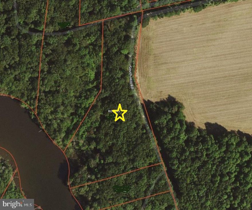 Peaceful and private 8.4 wooded acres, on private road. Elevated site offers views over Hull Creek with no current or future flood worries. Long road frontage offers many options for site plan layout. Over 200' of waterfront to enjoy nature, and place your dock. Gorgeous mountain laurels frame the path to the water, and tall hardwoods provide shade for any building site. No HOA! Buyer to verify water depth to own satisfaction.