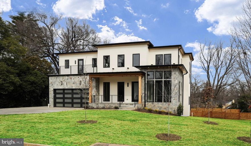 Presenting an exquisite contemporary masterpiece crafted by HR Developers, nestled in the prestigious Chesterbrook Woods neighborhood of McLean. This stunning residence sits graciously on a sprawling .35-acre corner lot, showcasing a sophisticated blend of stone and stucco exteriors. Boasting a plethora of luxurious amenities, including a 3-car garage, elevator shaft, 6 bedrooms, 6.5 bathrooms, and a sprawling 7,450 square feet across three levels, this home offers an unparalleled living experience.

As you step inside, you're greeted by soaring 10-foot ceilings and captivating 4" white oak floors that span the main level. The heart of the home is a chef's delight, featuring a magnificent gourmet kitchen equipped with a 48" Wolf range, 48" Subzero fridge and 2 Cove dishwahers.  A main level guest suite and a convenient three-car attached garage add to the functionality and comfort of the home.

Venture outside to discover multiple outdoor sanctuaries, including two balconies, a spacious porch with a gas fireplace, a large rear deck, and a patio area off the walk-out lower level, perfect for entertaining or unwinding amidst nature's beauty.

The upper level is dedicated to indulgence, featuring a lavish primary suite with a private balcony with treetop views, a convenient coffee bar, a spacious sitting area and a lavish walk-in closet with built-ins. The en-suite spa-like bathroom is a haven of relaxation, boasting double vanities, a luxurious glass-enclosed shower with dual shower heads, and a standalone soaking tub. The primary suite is a true oasis!

Descending to the walk-out lower level, you'll find a spacious rec room complete with a wet bar and a gas fireplace, an exercise room, and a media room with a 10" ceiling, ideal for a golf simulator setup. An additional bedroom with a full bathroom ensures ample space for guests and family alike.

Conveniently situated near the GW Parkway, parks, swim/tennis clubs, the newly remodeled Chesterbrook Shopping Center, and downtown McLean's vibrant array of shops and restaurants, this home epitomizes luxury living with unparalleled accessibility. Zoned for top-rated schools including Chesterbrook Elementary School, Longfellow Middle School, and McLean High School, it promises to deliver an exceptional lifestyle experience for discerning buyers.