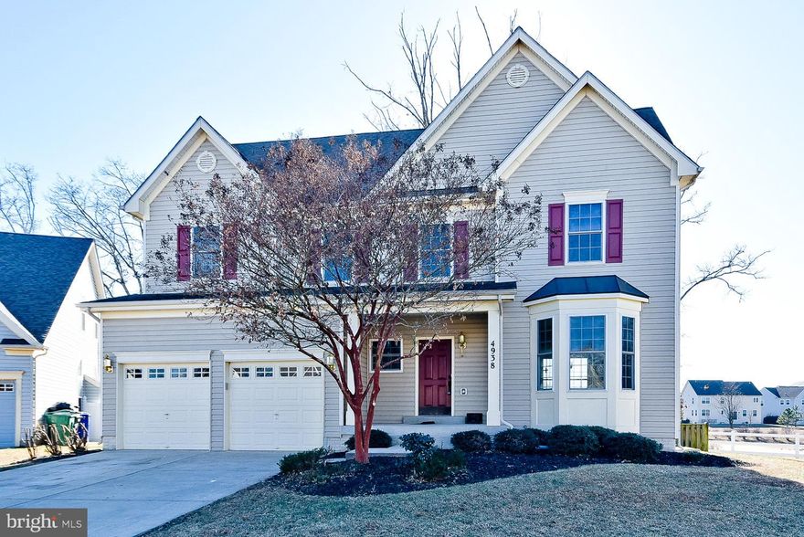 Gorgeous restoration to better than beautiful! Lovely two-story foyer*Sun-drenched, gourmet eat-in-kitchen w/center island, recessed lighting, and SS appliances*Entire rear of house overlooks a lake view*Crown molding, hardwood stairs and main level*Carpet in bedrooms and fully finished basement*Large owner's suite w/super bath and sep. shower*Lower level full bath, bedroom, and theater room*