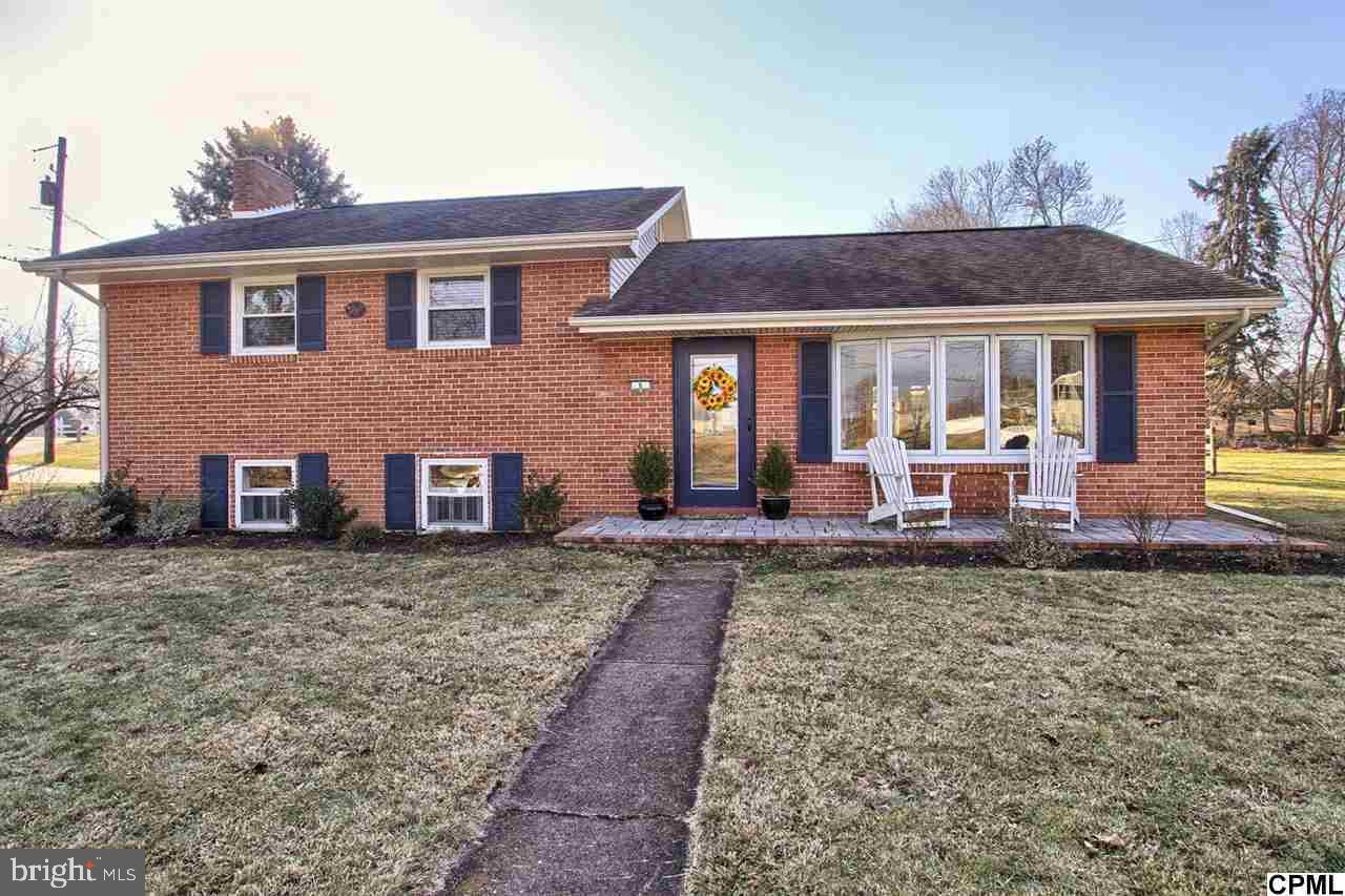 Handsome brick curb appeal, delightful d cor & updates, terrific cond., sprawling 1900 fin sqft layout! Hardwoods, chairrails, wainscot radiate character thruout. Updated kit w/ceramic, island, stainless, shaker-style cabs. Fin LL w/exp brick FP, built-ins, sep rec rm. Replacement windows. Quiet, private .36ac homesite w/oversized deck & in-ground pool. Outstanding location mins from Carlisle Pike shopping. Shows beautifully!
