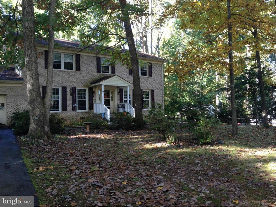 HUGE REDUCTION IN PRICE! OWNERS FOUND HM OF THEIR CHOICE. HANDSOME COL ON LG LEVEL LOT W/A FULLY FENCED BACKYD, RIMMED W/TREES OFFERING PRIVACY & ENJOYMENT SCREENED PORCH 12X17 PATIO 16X22 DECK 9X17.  LOVELY KIT WITH GRANITE & WD FLRS, BAY WIND IN EATING AREA. FORMAL LR& DR, CROWN MOLDING, CHAIR RAIL. 4 BRS & 2.5 BA,. PELLET STOVE IN FR. OVER SIZED 2 CAR GAR. SO MUCH UPDATED. AV MO UTILITIES $180.