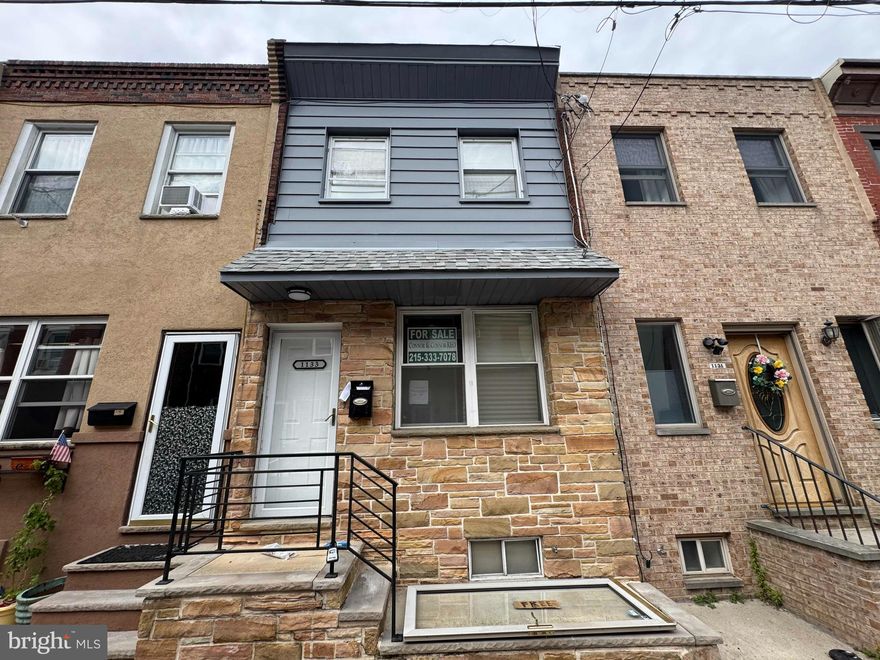 Welcome to 1133 Mercy Street—a beautifully renovated 3-bedroom, 1.5-bath rowhome nestled in the heart of East Passyunk Crossing, one of Philadelphia’s most vibrant and walkable neighborhoods. This move-in-ready home offers a thoughtfully designed layout featuring a spacious living area, a stylish powder room on the main floor, and a finished basement providing additional living space. The modern kitchen boasts sleek finishes and flows seamlessly into the dining area, perfect for entertaining. Upstairs, you'll find three well-appointed bedrooms and a full bathroom. Situated just steps from the lively East Passyunk Avenue, you'll enjoy easy access to a diverse array of restaurants, boutiques, and cultural attractions . Commuters will appreciate the proximity to major highways like I-76 and I-676, as well as the Broad Street Line, facilitating quick travel throughout the city. Additionally, the home is conveniently located near the South Philadelphia Sports Complex, home to Citizens Bank Park and the Wells Fargo Center, offering endless entertainment options . Don't miss the opportunity to own a charming home in a dynamic neighborhood that perfectly balances urban excitement with community charm.