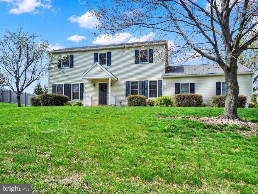 Welcome home to this beautiful 2 story Colonial nestled on nearly 1/2 acre lot, backing to peaceful open space offering both privacy & convenience within walking distance to Northeastern High School. Step inside to many freshly painted rooms and updated carpeting *Spacious Family Room features built-in bookshelves to display your favorite collectibles & books, cozy wood burning fireplace & french doors leading to lovely screened porch, perfect for relaxing or entertaining! *Gracious Kitchen open to Dining Area, includes breakfast bar & abundant cabintry *Living Room/Office will be a private retreat or ideal home office *Primary Bedroom boasts generous space including Sitting Area/Nursery, walk-in closet & Primary Bath with dual vanities * Convenient First floor Laundry and oversized 2 car garage with space for workshop *Furnace & Central Air 2023, Water Heater 2019 *This home provides comfort, space and updates in a fantastic location! See it first!