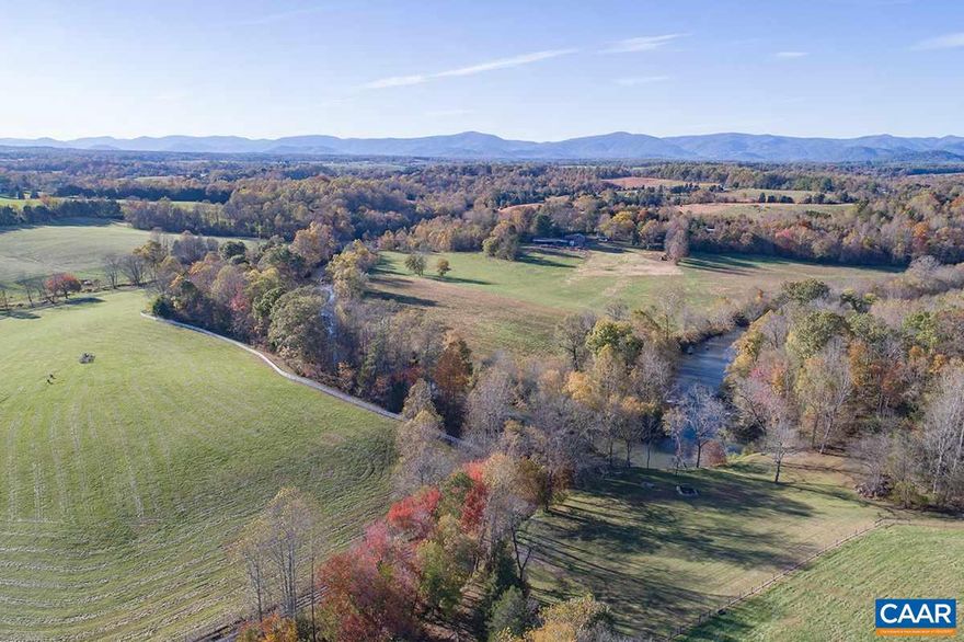 RAPIDAN RIVER FARM ? Tucked into the rolling countryside and fronting on the Rapidan River lies Rapidan River Farm. With its well-appointed country residence, spectacular Blue Ridge Mountain views, river frontage, fertile pastureland & dependencies, Rapidan River Farm embodies the essence & pleasure of country life in the Virginia Piedmont.,Fireplace in Bedroom,Fireplace in Great Room,Fireplace in Living Room,Fireplace in Study/Library