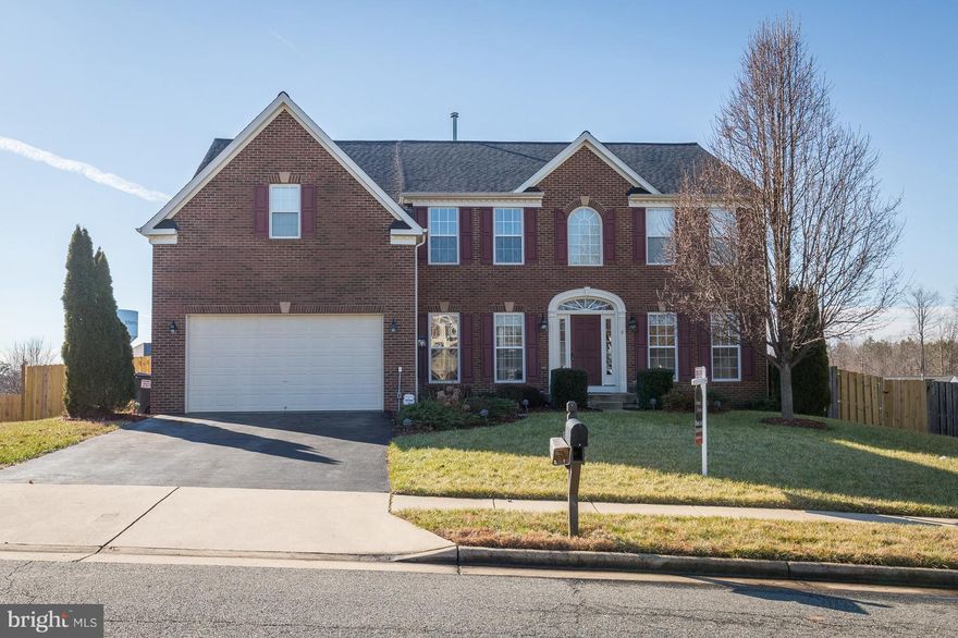 Gorgeous 3 finished level brick front Colonial.  Total 6/7 bedrooms (bedroom # 7 in basement NTC) and 4 1/2 Baths, 2 Kitchens & 2 laundry rooms. Main level has gourmet kitchen with large island, Upgraded appliances *  large Morning rm. Walk out to  new updated deck. Open to Family Rm.  Study/Office on main level. Upper level has 5 bedrm and 3 full baths, 5th bedrm is being used a 2nd Family Rm.  Basement is fully finished with  2 additional Bedroom,( 6th bedroom) is 20x17. #7 is 12x15( NTC)  4th full bath.  2nd full Kit. and large Rec rm. Has  large window with plenty of natural light.  Walk out to fully fenced back yard with  16x20 Custom Built Storage Shed, John Deere 48" cut tractor conveys with acceptable contract. Garage with extended craftsman work area.  New in 2018 Roof, 1 HVAC upper level, Water Heater, Interior Painted.  Home has 5467 finished Sq ft. Owners   offering a carpet                                                                    allowance's