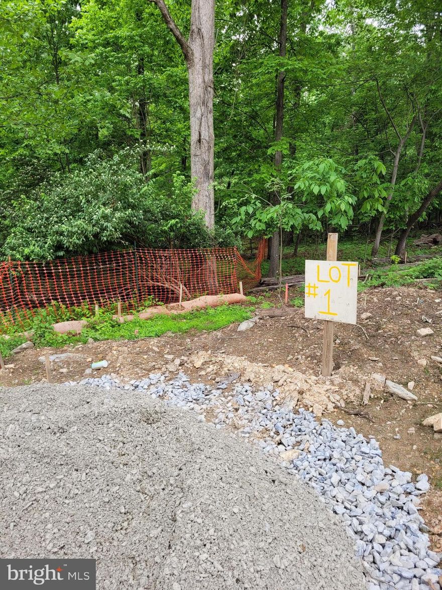 Great 2 acre parcel, buildable lot. public water and sewer nearby. all suitability/feasibility studies are to be done by buyer at buyer expenses,