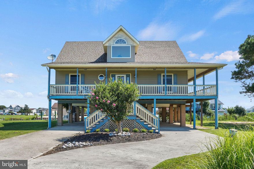 3/1434 Waterfront Living at it’s best!  This home offers water views from almost every room in the house and the extensive wrap around porch is perfect for enjoying either bay vies or canal views and perfect for outdoor gatherings. Custom Built with spacious living, home features cathedral ceilings, new fireplace, large kitchen with custom cabinets, granite counter tops, stainless steel appliances, gas cook-top with filler pot to enjoy the crabs caught in your back yard. Formal Dining Room, eat in kitchen, primary on first level, workshop for the handy man, park you boat at your back door, recent updates and the list goes on, truly a must see to appreciate!  What more can you ask for? Schedule your appointment today. Captains Cove is a Golf and Waterfront community located on the Eastern Shore of VA nestled on the Chincoteague Bay, close to Chincoteague Island VA, Wallops Island & Ocean City MD. HOA amenities: Pristine 9 Hole Golf Course, indoor/outdoor pools (2), fitness center, basketball, tennis & pickle ball courts, boat launch, playground, biking & walking trails, dog park, security and so much more.