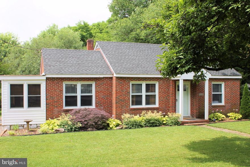 ***MOTIVATED SELLER*** This is the one!!!  Perfect starter home or investment property.  It would be hard to find a cuter, more charming, all brick rambler at this price!!! Located in the quaint/upcoming town of Marshall. Owners just painted it inside and out!!! Well maintained throughout. House has a very bright, open, modern kitchen. Great fenced in yard with large shed for storage.