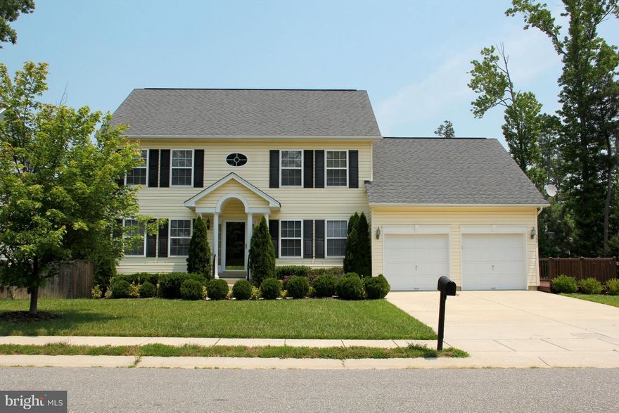 This home is beautiful and ready to move in!  Fully fenced in large back yard, lovely back deck,  walk out basement,  kitchen island with stained glass lighting, very spacious.  open floor plan.  New washer and dryer. You will be impressed with the craftsmanship and unique features such as the bar & bonus room in the basement, even a theater with a stadium seating arrangement!