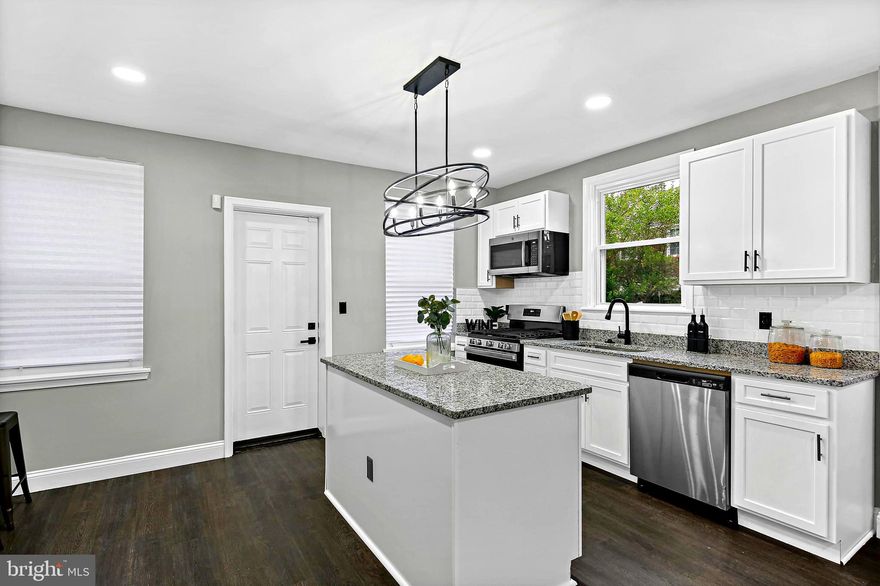 ARE YOU STRUGGLING WITH THE HIGH INTEREST RATES SELLER IS WILLING TO ENTERTAIN A LEASE WITH YOU UNTIL RATES DROP!! Call me for details.
 ******BACK ON THE MARKET********, this is your chance to own this beautiful home!!  Looking for that unique one-of-a-kind home well look no further this Fully RENOVATED end unit is located on a quiet street. LOTS of extras with this beauty, Bluetooth speakers in both bathrooms, High tec Wi-Fi touch screen thermostat, Alarm system, remote control ceiling fans, Rocker light switches, New floating floor on main level is easy on the back, custom onsite handmade railing adds beauty and style, kitchen island with a Unique chandelier, granite counter tops, Soft close kitchen drawers and cabinets,  Stainless steel appliances, floating table in the kitchen, recessed lighting and MUCH MORE!  OFF Street parking in the fenced in parking pad in the rear of the home, easy access from a Clean drivable alley!!  This is a must see!!  
You may qualify for one of many Homeownership incentives that Baltimore City Housing is offering right now, you could qualify for up to $20,000 be sure to ask your Loan Officer, not yet qualified give me a call and I can assist you!