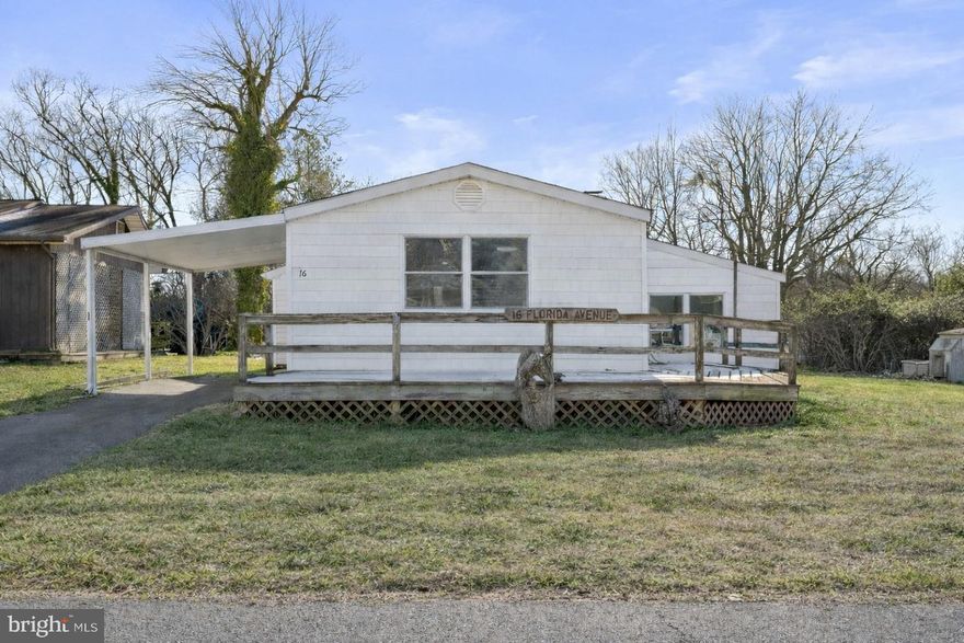 Welcome to 16 Florida Avenue, Earleville, MD, a beautifully renovated ranch-style home offering over 1,431 sq. ft. of living space, ideally located on a quiet back street in a desirable water-oriented community with beach access.

This 3-bedroom, 1 full bath home was completely renovated down to the studs in 2021, allowing the next owner to enjoy the benefits of extensive upgrades throughout. The open floor plan seamlessly connects the living room, dining area, and kitchen, creating a functional and inviting living space.

The kitchen features white cabinetry, black granite countertops, and GE stainless steel appliances, while the home is enhanced by ¾-inch thick, 3-inch wide sanded and stained hardwood floors. A spacious family room offers a wood stove and slate flooring, providing additional living and entertaining space.

Major improvements include all new plumbing and electrical systems (2021), Andersen Low-E windows, and a Pella sliding door with built-in blinds in the primary bedroom. The updated full bath features a tile surround, and the home is equipped with a high-efficiency Amana heat pump, 50-year architectural shingles, and updated siding.

Additional highlights include a stackable washer and dryer, a large front deck, storage shed, and seasonal water views. Residents enjoy access to community amenities including boating, watersports, and beach access.

A thoughtfully renovated, move-in-ready home offering comfort, quality, and lifestyle in a waterfront community.