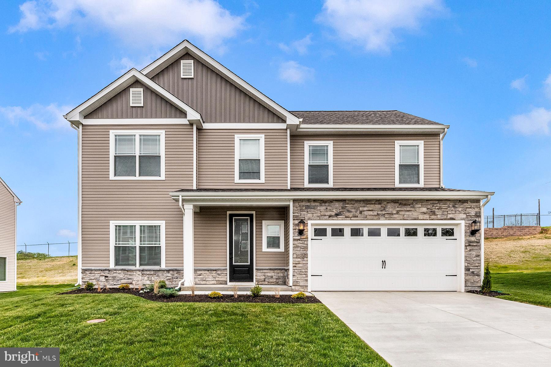 Step Into Comfort and Style with the Erie
The Erie is a thoughtfully designed two-story home that blends classic charm with modern convenience. Its eye-catching stone-accented exterior and welcoming covered porch create instant curb appeal and a warm first impression.
Inside, the main level opens into a spacious, open-concept layout that seamlessly connects the kitchen, dining, and family rooms—perfect for both everyday living and effortless entertaining. Whether you're hosting weekend get-togethers or enjoying quiet nights in, this space adapts to your lifestyle.
The kitchen is the heart of the home, featuring stylish finishes and generous counter space that make cooking a pleasure while keeping you connected to the action.
Just off the garage, a practical mudroom keeps things organized with a dedicated drop zone for coats, shoes, and bags. Upstairs, you’ll find well-sized bedrooms, a convenient laundry room, and a layout that offers both comfort and privacy for the whole family.
With its functional design and welcoming feel, the Erie offers more than just a place to live—it’s a place to thrive.