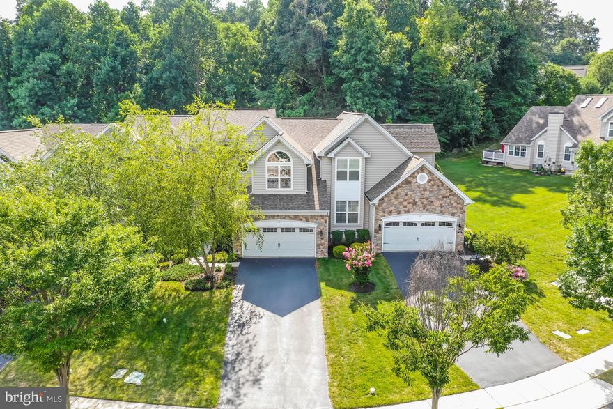 Welcome to this absolutely stunning, Toll Brothers carriage home in the sought-after Byers Station Creekside community!  Downingtown East Schools, STEM academy and Byers Station with its resort style living, community clubhouses, two swimming pool complexes, walking trails, tot lots and basketball courts!  This one won't last!  One of the largest Toll floor plans the Victoria featuring impressive upgrades, a huge finished walk out basement with a full bath plus a 3rd floor loft that can be used as an office or even a 4th bedroom! Enter the home through the secluded, inviting landscaped front walkway. The entrance foyer opens up to the impressive formal dining room with plenty of room for holiday entertaining and complete with impressive upgrades including tray ceiling, crown molding, wainscoting and gleaming hardwood floors. The open floor plan on the first floor also boasts a cathedral ceiling living room with a full wall of windows  as well as a specious expanded family room highlighted by a cozy gas fireplace. Plenty of sunlight with double windows on both sides of the fireplace and a French door to the deck!  The over-sized Trex deck off the family room makes entertaining a breeze!  The gourmet kitchen features polished granite counters, custom cabinetry, gas stove, a beautiful tile back-splash and a convenient breakfast bar.  The expanded sunny breakfast nook gives you lots of additional room for family meals and the open floor plan gives access to the kitchen and family room for parties and meal preparation.  Gleaming hardwood floors accent the entire first level! Completing the first floor is a convenient powder room and a full-sized laundry and pantry with access to the expanded two car garage.  An elegant turned oak stair case leads to the second floor with a grand master suite that boasts dual walk in closets and a luxurious master bath.  Your own private oasis!  The second spacious bedroom features a palladium window and a large walk in closet.  In addition, a third large bedroom and a lovely full bath complete the second floor. But still another upgrade -  the third floor includes a large loft that is currently used as a private office, but could also serve as a 4th bedroom!  Even more living and entertaining space in the inviting walk out finished lower level with over 900 sq. ft and even another full bathroom!    Toll Brothers at Byers Station - this desirable community makes life easy with amenities included like lawn care, Snow Removal, Exterior Maintenance, Recreation areas, Pool and Clubhouse, Tennis and Basketball Courts and Playgrounds.  Only minutes to the Pa Turnpike and RT 202, 100 and Rt.30 in the highly acclaimed Downingtown East School District and STEM academy.  The perfect place to call home!!