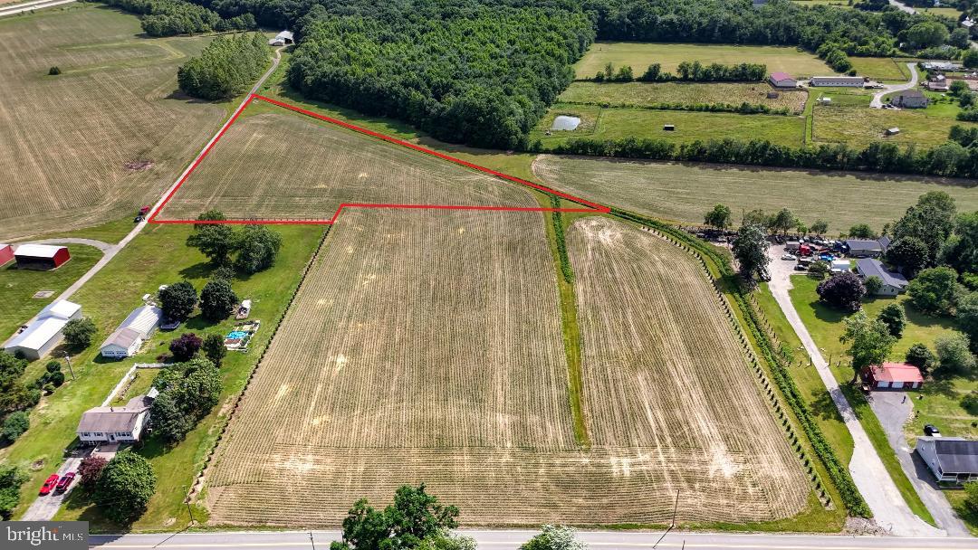 No Builder Tie in. Lot 4 has 4 Acres site evaluation is on file. Land is being farmed til October