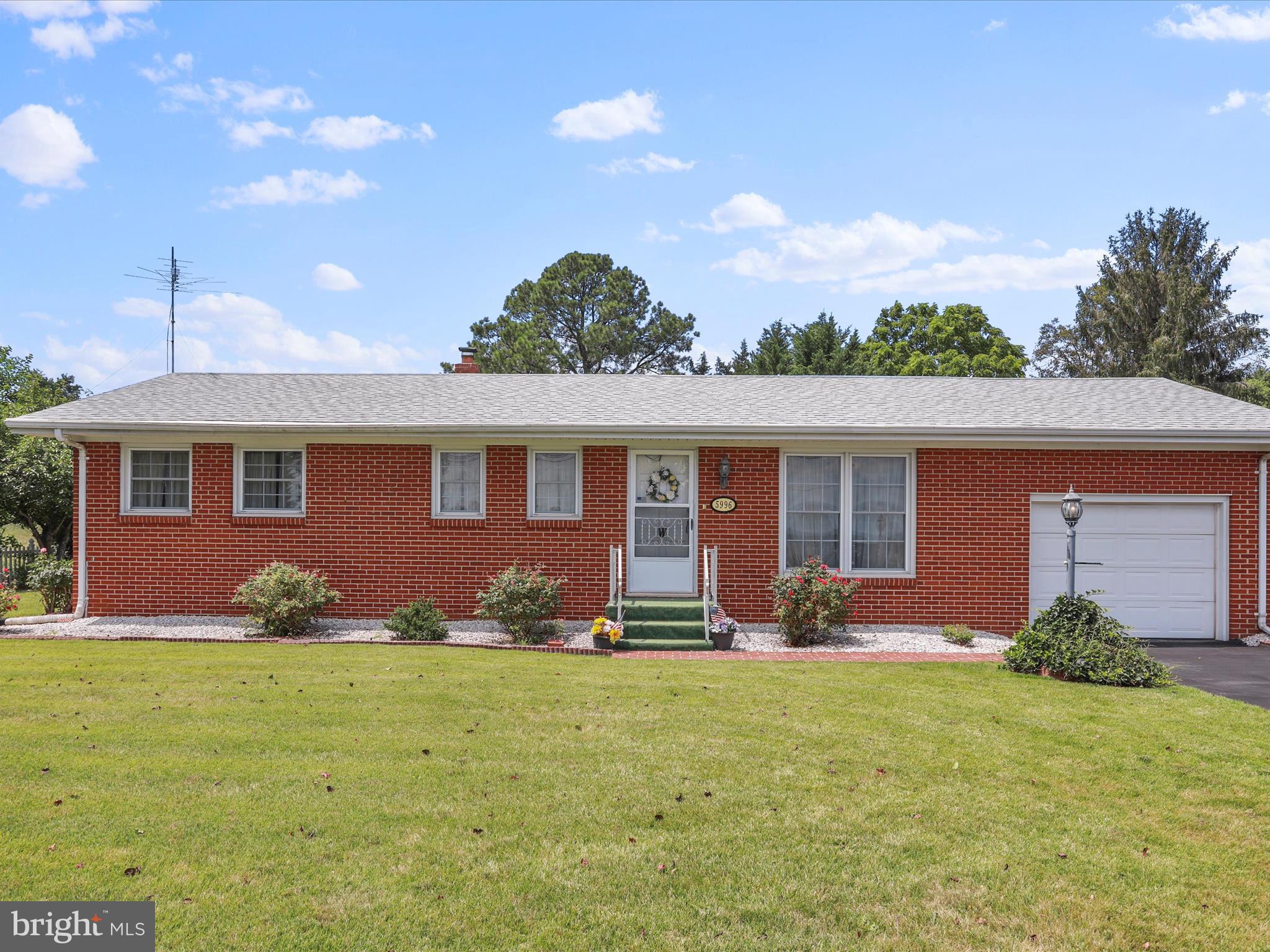 Welcome to 5996 Valley Pike in Stephens City! This charming home sits on a spacious double lot just outside town limits, offering a quiet setting with convenient access to I-81. Inside, you’ll find 3 bedrooms, 1.5 bathrooms, a bright and spacious living room, a functional kitchen, and a dedicated dining area. The primary bedroom features an attached half bath, with a full hall bath nearby. A partially finished basement provides extra living space and plenty of potential to make it your own. Enjoy the large backyard and cozy rear patio—ideal for relaxing or entertaining. Located just minutes from local restaurants and shops, and only 0.2 miles from the Family Drive-In—perfect for a fun night out!