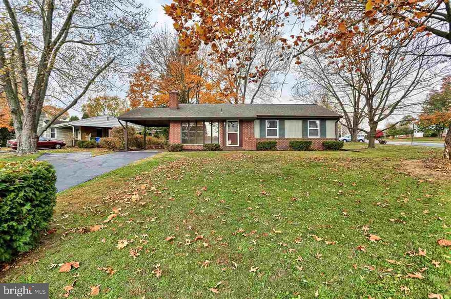 Meticulous 3 BR, 2 Full Bath Brick Rancher w/1 Car-Carport in Central School Dist. Fresh paint & newly refinished hardwood flrs. throughout. C/A & Gas heat. Master bedroom has en-suite bathroom. New windows installed 11/2014. Elec. panel upgraded 11/2016. Wood burning fireplace in liv. rm. Newly landscaped yard & covered back porch are great for entertaining. Walk to nearby community pool & park w/walking trail. Close to Rt 30/I83. Welcome home.