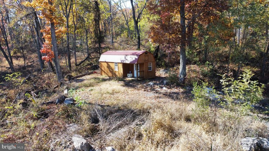 "There's no place like Ritter's". The perfect place to play... Hunt, Fish and explore on the tippy top of the mountain.  A short scenic drive from Winchester, Va or  Washington, DC and you've made it to the perfect escape! Over 2 Acres of your own but hundreds to enjoy if you join the associations hunt club. Multiple ponds, tennis court and views to experience. The shed on the property conveys and  would be perfect for all your toys or could be converted for your camping trips. Great area for full time living, weekend visits or rent out for others to enjoy. Area is known for all the wildlife you eagerly expect to encounter in the Wild and Wonderful West Virginia.