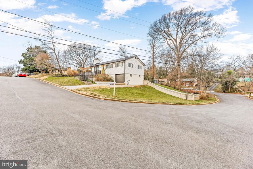 Welcome to your charming future home in highly desirable Admiral Heights! Water privileged with your own community dock. Close to all things Annapolis, including the City Dock, the Naval Academy and Stadium, Anne Arundel Medical Center, and shopping.

You will feel the loving care as you walk through the unique front door and you see the beautiful, well-maintained natural oak floors and wood fireplace. The light and airy first floor also includes three good-sized bedrooms and an upgraded full bath. The generous dining area leads to the adorable galley kitchen with granite countertops, stainless steel appliances, and a built-in pantry. The large deck overlooks the impressive back yard and the community swimming pool.

Finished basement has another full bath, kitchenette, laundry, and a massive fourth bedroom or family room with a raised, lighted ceiling and large closet. Ground floor back door has access to lovely small patio on the lawn.

Beautifully landscaped corner lot with upgraded hardscape sidewalks, steps and driveway. Rare attached one car garage. New roof,  gutters and exterior paint.

You're home!