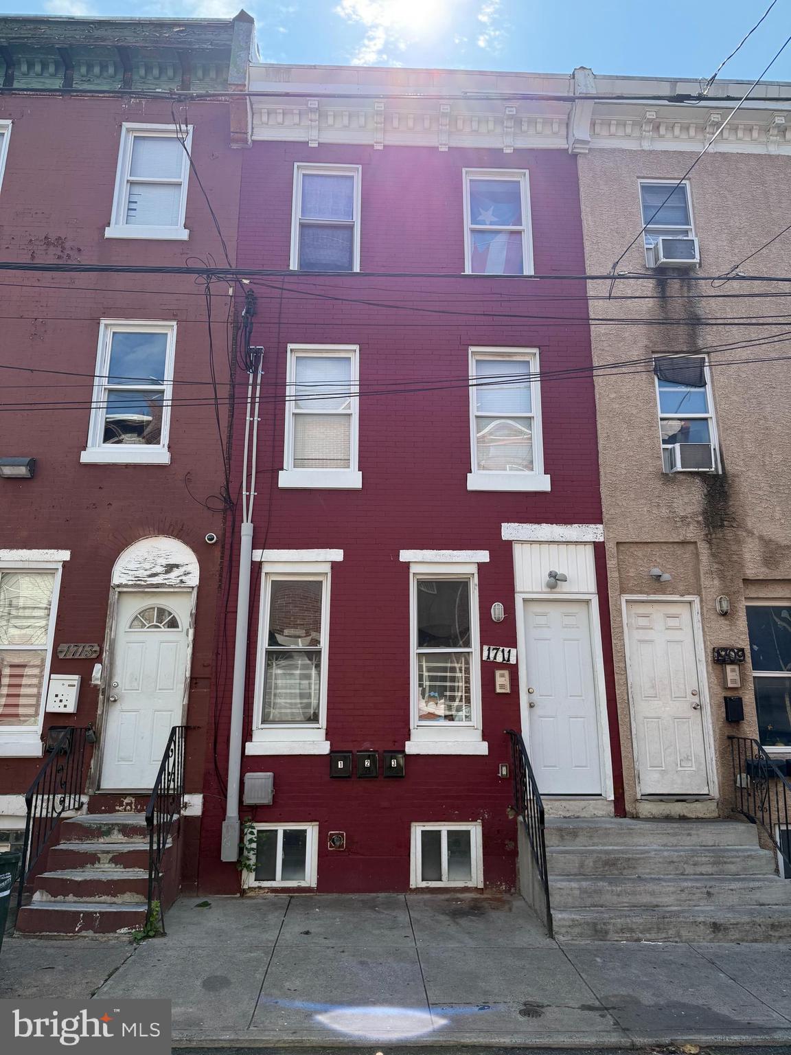 Prime Investment Opportunity:offers a fantastic investment opportunity in the desirable Temple University area. With a strong income , the property generates a gross monthly income of $3,000 and a gross annual income of $36,000. Tenant Convenience :each of the three 2-bedroom, 1-bathroom units boasts desirable amenities including a full kitchen and an in-unit washer and dryer . These " all electric" separately metered utility units providing ease of management and potential cost savings for the new owner.Excellent Location: located near Temple University, which residents benefit from a very walkable neighborhood with extra private school security staff. with excellent transit options . Each unit has vibrant fresh paints adorned upon each of the the Three- 2 bedroom/1 bath units. Decorum include fireproof hardwood floors, complete fully featured kitchens with compact washer and dryer appliance with a classic but modern appeal.The property's "Straight Thru" architectural style is typical of the area, and the proximity to Temple University ensures a reliable pool of potential tenants to screen from.This triplex offers a stable and attractive income stream due to its desirable location and sought-after amenities.