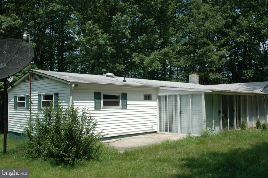 Secluded home with newer kitchen and baths, newer appliances, carpet and fresh paint. Nearly 3 acres of privacy. Large shed and detached garage.