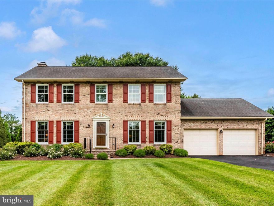 Welcome Home to 7904 W. Brookridge Drive.  This stunning 4 Bedroom, 2.5 Bath Brick Colonial Home is well appointed on a spacious 1.48-Acre Lot.   This Ausherman built home showcases exceptional craftsmanship and attention to detail.     The Main Level offers Formal Living/Sitting Room, Formal Dining Area and a generously sized family room with a fireplace, creating a warm and inviting atmosphere.    The Kitchen has been recently updated with new appliances, island and quartz countertops.    The sliding glass door takes you out to the beautiful backyard where there is a rear deck perfect for family gatherings or just having coffee in the morning.       The Upper Level offers a primary suite with walk in closet and en-suite bathroom.   3 additional generously sized bedrooms and a full bathroom round out the upper level.   The lower level is partially finished and is perfect for entertaining, there is ample area for storage in the lower level as well.   The exterior of the home is equally impressive, with a beautifully landscaped yard the expansive 1.48-acre lot provides ample space for outdoor activities, gardening, or even the possibility of adding a pool or additional structures.   Located in the desirable Brookridge North Community of Middletown, this home offers a peaceful and scenic setting while being just minutes away from schools, shopping, dining, and recreational amenities. With its impeccable design, quality construction, and prime location, this brick colonial home offers the perfect combination of luxury, comfort, and convenience.