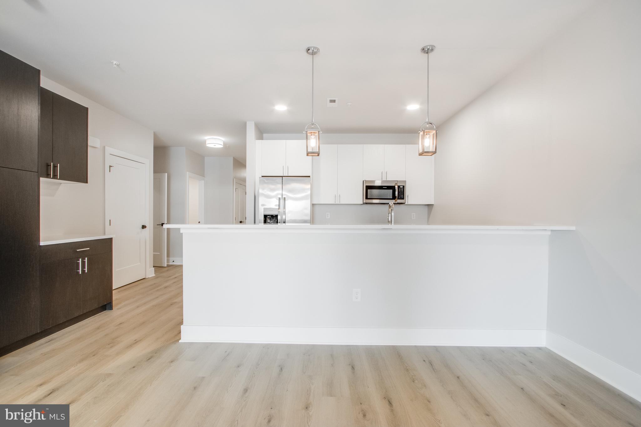 FLATS AT COASTAL STATION - Residential