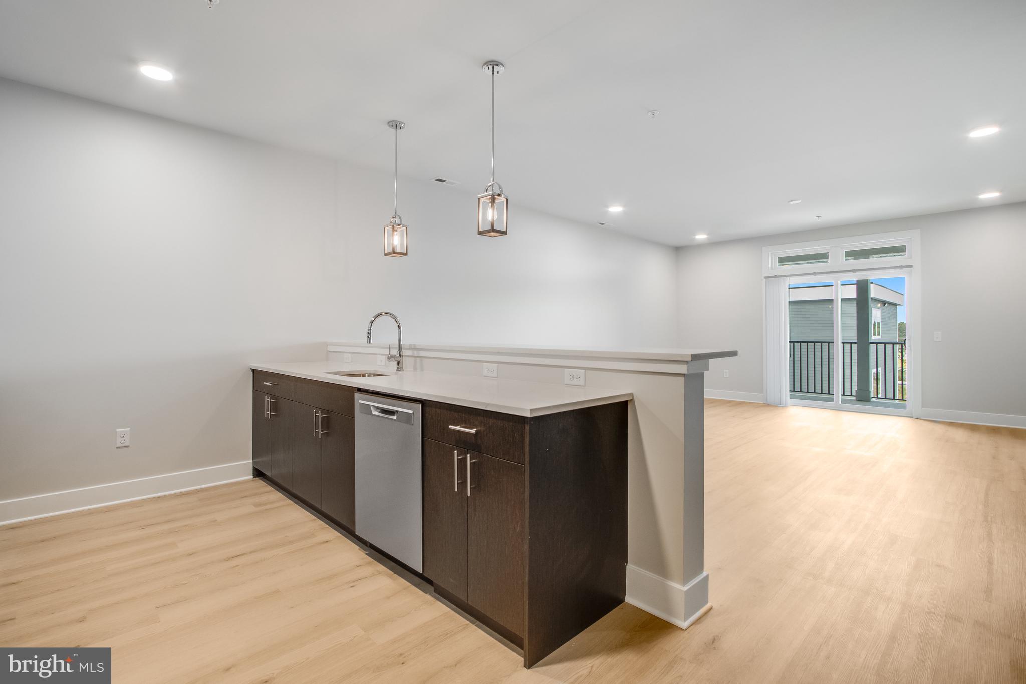 FLATS AT COASTAL STATION - Residential