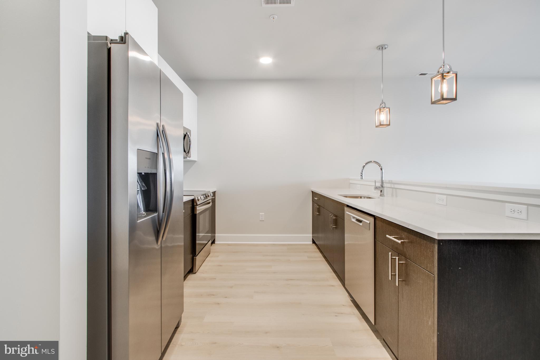 FLATS AT COASTAL STATION - Residential