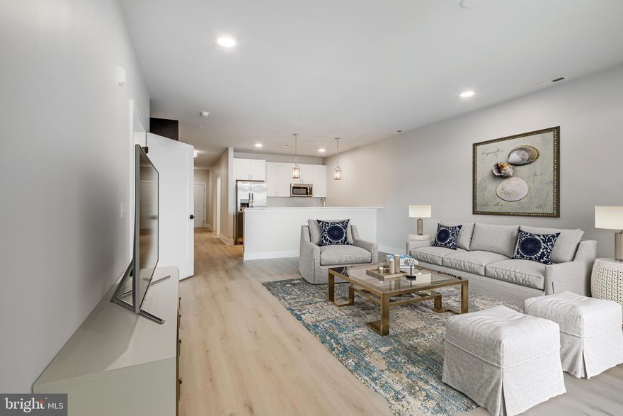 Unique and limited opportunity to own one level new construction East of Route 1 in Rehoboth Beach, Delaware. These elegant upscale condos feature Quartz countertops, stainless steel appliances, 42 inch kitchen cabinets, butler's pantry and dry bar, led downlighting, walk in closets, coastal luxury flooring, nine foot ceilings, tile showers with glass enclosure, custom interior molding and doors, full size stacked washer and dryers and private balconies. The community amenities include a beautiful fenced in pool, outside grill, gazebo and firepit, gated covered parking spots, and an enclosed dog run. Residents also have private access to co-working spaces, conference rooms, a beautiful lounge space, a fitness center, a coffee station, storage lockers and a bike storage room. The building has two convenient elevators and common spaces for mail delivery and trash pick up.  Sales center on site daily 10:00 - 4:00 pm.The community is located within a quick walk or bike ride to the outlet center and Breakwater bike trails as well as a quick car ride to the beautiful coastal beaches and State Parks of both Rehoboth and Lewes. Unit 312 is a Retreat floor plan.
. Taxes to be determined.No water or sewer impact fees. Some photos have virtual staging for design ideas. 
LIMITED TIME INCENTIVES - Seller paid transfer tax and $17,500 in closing cost assistance OR Seller paid furniture allowance with designer assistance on ordering and set up! 5 Year American Home Shield Warranty now available - inquire for details.