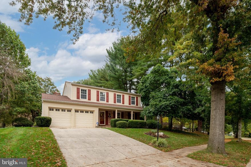 Welcome home to this beautifully maintained Colonial in the heart of Columbia! This spacious home offers classic curb appeal, bright and open living areas, and a wonderful flow for entertaining or family gatherings.  Gleaming hardwood floors are found in the formal living room & dining room; The thoughtfully renovated kitchen combines classic finishes with a spacious, well-planned design that offers exceptional storage and efficiency;  The stainless steel appliances include a dual-fuel range,  a french style refrigerator, built-in microwave & dishwasher;  A half bath is located just outside the kitchen too.   Step down into the inviting family room with a gorgeous stone fireplace/hearth with a gas insert; A sunroom is located just off the family room and has a mini-split for year-round enjoyment.  The sunroom opens  directly to a lovely stone patio where you can sit and enjoy the serene backyard with a multitude of blooming perennials in the spring & summer.  Upstairs, you’ll find a large primary suite with a walk-in closet and an updated full bath;  3 other generous-sized bedrooms; a renovated hall bathroom, & more gleaming hardwood floors.  The finished walk-up lower level has new carpeting, recessed lighting, and a large laundry/utility room with utility sink and plenty of extra storage.  Enjoy all the conveniences of Columbia living with nearby Cedar Lane & Centennial parks, nature paths, shopping, and top-rated Longfellow Elementary school is a 1 minute drive away as is the Longfellow pool!  Come see this one - You'll fall in love!!!