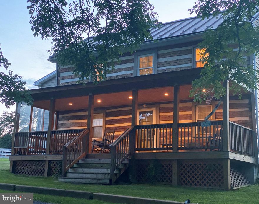 LOOKING for a Renovated c. 1850's Log Farmhouse w/guest cottage? Welcome home to your 4 bed 3 bath Bucolic "farmette" that offers breathtaking mountain views from your front porch, and an adorable one bed/1 bath Guest Cottage ....perfect for an Airbnb! The main Log home had a new addition in 2000  including a metal seamed roof all around, eat in kitchen w/appliances, family room w/gas fireplace, primary suite/double vanity sinks, huge walk in closets, tons of storage, natural light throughout the home, home office, french doors, high speed internet available, & gorgeous hardwood floors (original log portion offers “original” heart pine floors). There is a superb view of mountains from your front yard, OR watch your favorite Equestrian from your Cozy front porch! The back of the home offers pasture/barn views from the expansive decks…wonderful for family fun or entertaining. The Farm offers  almost 8 acres of fenced lush grass pastures, outdoor regulation 20x60 Dressage arena, jump field, huge run in shed (could convert to more stalls), original wood Hay barn w/foaling stall & workshop area, 2 stall Morton Barn w/tack & feed room, dutch doors & overhang. LOCATION is fabulous  walking distance from Seven Bends State Park & Muse Vineyard, 1 in to the Shenandoah Vet clinic, 2 miles to Hwy 81, a few miles to shopping/dining/medical, 1.30 to Lexington Horse Center, 40 min to Marshall, 30 min to Winchester, & 1 hr to Warrenton/The Plains!!

AHS Home warranty conveys with home