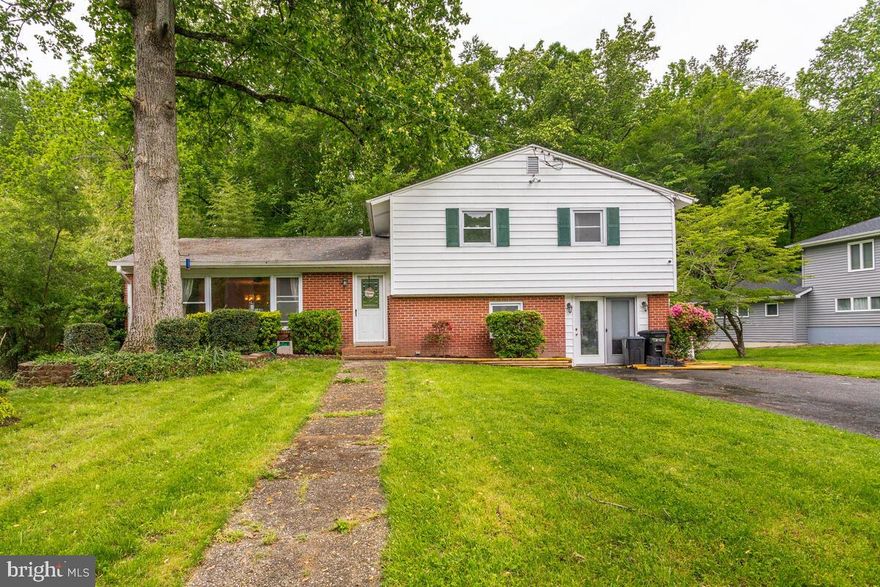 VA Assumable Loan eligible with an interest rate of 2.375%!  Welcome home to this beautiful, move-in ready 3 bedroom, 2 bathroom home.  As  you enter, you will love the gleaming hardwood floors which opens up to the living room featuring a pellet stove for those cool, crisp nights!  Off of the living room, you will find the updated kitchen featuring quartz countertops, and a separate dining room.  Enjoy those beautiful summer nights outside on your screened in porch or in your private backyard surrounded by trees.  As you head upstairs, you will find 3 spacious bedrooms and 1 beautiful, renovated bathroom.  As you head downstairs, you will find a large second living room, a full bathroom, a laundry room, and a workshop.  This home is close to many restaurants, shopping, NAS Pax River, and more!