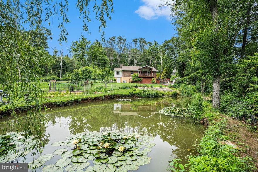 Charming 4-Bed Ranch on 2 Acres in Rose Tree Media School District.

Tucked away in a peaceful, wooded setting just minutes from Ridley Creek State Park, this spacious 4-bedroom, 1.5-bath ranch offers the perfect blend of privacy, and charm. Situated on nearly 2 acres in the highly sought-after Rose Tree Media School District, the home provides ample space inside and out, with thoughtful updates.

Inside, you’re welcomed by a cozy nook that's perfect as a reading or computer space, flowing into a sunny dining area, and an inviting living room with a wood-burning fireplace. The kitchen features modern updates and opens straight out to the covered back porch, where you can take in the peaceful view of the koi pond and the large above-ground pool—complete with its own deck.
Upstairs, you'll find three bedrooms and a full bath. Downstairs, the almost full finished basement adds even more living space, with a fourth bedroom, half bath, laundry room, and direct access to the walkout garage. The extended driveway easily fits six or more cars—perfect for guests or extra parking.

Outdoors, enjoy evenings on the back porch or outdoor fireplace, pick fresh vegetables from the garden, or collect eggs from the chicken coop—yes, the chickens can stay! Whether you're relaxing poolside, sipping coffee on the porch, or exploring your own private two-acre escape, this property offers a rare blend of rustic charm and modern comfort.
Recent updates include a brand-new HVAC system (installed just one month ago), new kitchen floor tiles,  updated laundry room, new covered deck, and utility upgrades such as a 2022 water tank, a newly replaced water pump and heater, and a new LG washer. The property also offers the option to easily connect to public water.