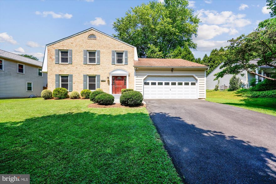 OPEN SUN 7/27, 1-3PM!
RENOVATED & SUN DRENCHED HOME ACROSS FROM PARK
Welcome to this beautifully updated 4-bedroom, 3.5-bath home nestled directly across from the serene Woottons Mill Park and within short distance to top-rated schools: Robert Frost MS, and Wootton HS. With no HOA fees, this sun-filled residence boasts a long list of recent renovations including  new windows (2018), water heater, new gutter, designer front door, fully reinsulated and sealed attic for year-round energy savings,  an electrical system with a sub-panel to support today’s high-tech lifestyle as well as a pantry addition (2021) and beautifully upgraded fireplace and chimney.

Step inside to a bright and inviting Foyer featuring hardwood flooring, a double-door coat closet, and access to a half bath and a large two-car garage with attic. The light-filled Living Room offers two oversized front windows, while the formal Dining Room features chair and crown molding.   The renovated eat-in Kitchen shows off granite countertops complementing modern white cabinets, SS appliances, a deep stainless-steel sink,  a decorative tile backsplash, and recessed lighting.  Adjacent are Pantry closet and Laundry closet with washer, dryer, and shelving . Sliding glass doors lead to a large fenced backyard with a private flagstone patio, perfect for outdoor entertaining, gardening, or relaxing in the shade. A cellar-style door leading to the basement adds convenience.    Just off the Kitchen, the inviting Family Room is centered around a beautifully redone wood stove fireplace (2021) with brick surround and a sleek metal mantel. French doors access to the backyard, and recessed lighting brightens this cozy gathering space.

Upstairs, Berber carpeting extends through the hallway and into four comfortable bedrooms. The Primary Suite includes two double-door closets, a ceiling fan with light, and a private Full Bath with ceramic tile flooring, a Glacier Bay fixture and a vanity with ample drawer and cabinet storage. The three additional Bedrooms each offer generous closet space, ceiling fans, and unique features such as built-in shelving and a delightful window seat with a custom cushion. A fully renovated Hall Bath completes the upper level.

The finished Lower Level features a spacious recreation room with Berber carpeting and  a bonus room—perfect for a home office or guest suite—includes two closets and hidden access to a massive walk-in storage area. A full bath with a walk-in shower completes the lower level.

Enjoy direct access to Woottons Mill Park’s scenic trails, playgrounds, and open green spaces—your peaceful backyard extension just steps away. Just minutes to major commuter routes, top-tier schools, and a warm, inviting atmosphere throughout, this move-in-ready home delivers the best of Rockville living!