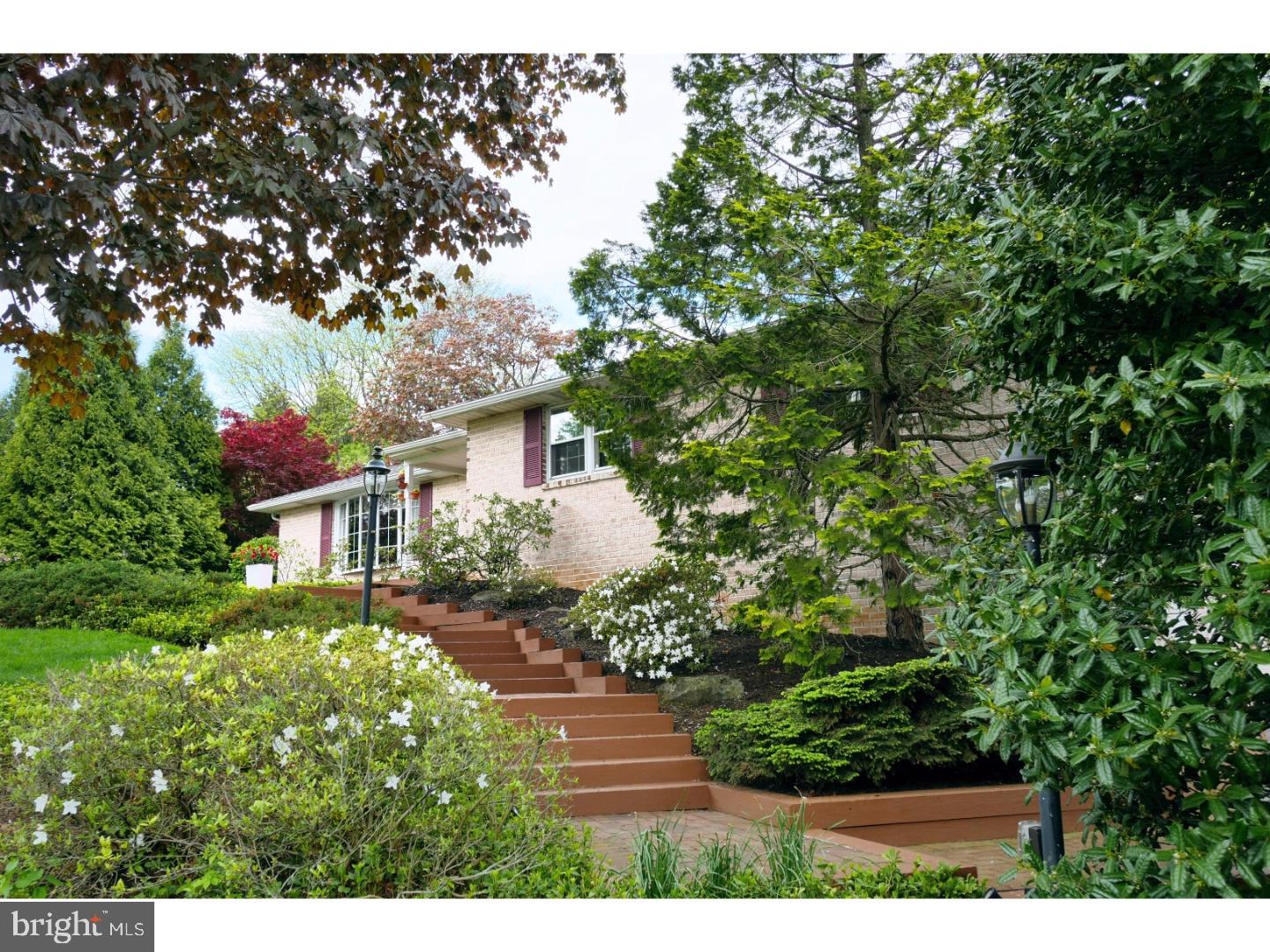 One of a kind raised, brick expanded ranch has the perfect combination of functionality and elegant entertaining. The focal point of this home is the 30x20 great room boasting vaulted ceilings and a wall of windows overlooking the meticulously maintained gardens sweeping over a a 40x20 custom Sylvan pool w/ multi-level patio spaces and Cabana pool house. Large, gourmet kitchen has undergone a Hollywood style make-over with GE Monogram Pro stainless appliances, a 9ft. center island with level 5 Brazilian granite and under-counter beverage/wine center. Breakfast room has a full wall flagstone wood burning fireplace and 13 ft. mantle. Owner's retreat has dual walk-in closets and Spa bath featuring a 8x4 2 person shower and seamless glass enclosure, over-sized jetted tub and multi-vanities. Walk-out lower level has second family room w/ brick fireplace & 2 additional bedrooms. Multi-level patios, perfectly manicured 1 acre, semi-private lot. One year home warranty is being offered!