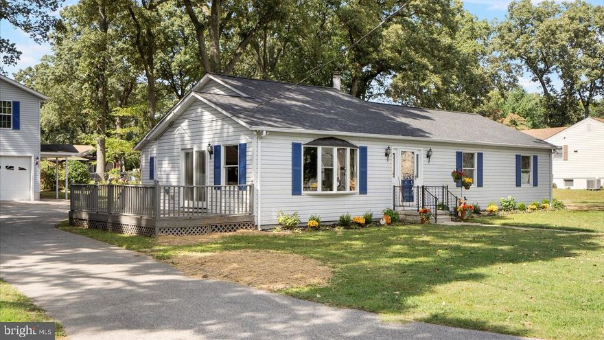 This property is so special it has been in the same family for over 60 years. Huge 1/2 acre lot with deer frequently roaming in the yard. Waterview of the Magothy river from the family room window or on side deck. This 4 Bedroom, 2 1/2 bath home offers some special features. Heated kitchen floor. 2 sources of heat with back up heat. Emergency generator panel with generator. House has been recently updated and shows beautifully. The family room is a huge great room over 20 x 20 so bring your large families. Tons of parking in garage and driveway and also overflow parking on common area in front of the home. The Long Point Community offers community hall for rental, boat ramp, and beach area for fishing, crabbing and relaxing within a few feet of this home. Special features of the home include a 2 story oversized garage ready for a mechanic or woodworker. Garage has electric with own circuit panel and electric heat and
window AC on second floor. Please note the garage will be cleaned out before settlement. All picky buyers come now, you will not be disappointed!