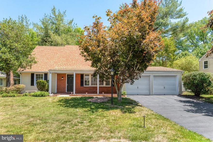 ** Welcome to this expanded Ashley model Cape Cod, perfectly situated on a quiet street in the highly desirable Greenbriar community. This home offers the space, updates, and charm.  A rear addition adds approximately 300 square feet, creating a spacious great room anchored by a beautiful brick fireplace. The perfect spot for relaxing or entertaining. This extra living space truly sets the home apart from the typical Ashley model. With 4 bedrooms and 2 full bathrooms, this home offers flexibility for a variety of living needs. The lower-level bathroom has been newly renovated, and the home has been freshly painted throughout.  Brand new LVP flooring flows through the main living areas, while new carpet in the bedrooms adds comfort where it counts.   A rare 2-car garage and a layout that balances openness with functional living spaces.  All of this in the sought after Greenbriar neighborhood known for its convenient location near shopping, dining, major commuter routes, and just minutes to Dulles Airport and NO HOA.   Move-in ready, expanded, and located on a quiet street, this one check all the boxes. Don’t miss it.