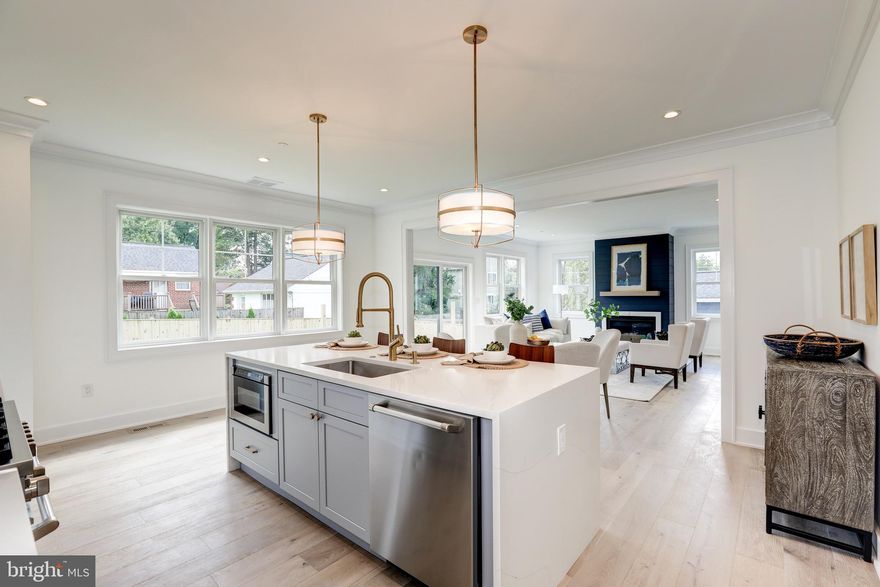 Welcome to 4912 Bangor Drive in Garrett Park Estates.  A GORGEOUS BRAND NEW HOME IN GARRETT PARK ESTATES - KENSINGTON! This high quality new construction offers everything that you are looking for in your new home, including an open floor plan with great spaces and lovely finishes with attention to detail. You will enjoy and appreciate the high quality craftsmanship on 3 finished levels with approximately 4,829 sq. feet of amazing living space. This masterfully designed and built home provides ample formal spaces for entertaining and comfortable everyday living with high ceilings, pretty crown molding and generously sized rooms. Stunning white oak hardwood flooring  on the main and upper levels, Anderson windows, custom light fixtures, a mudroom, a gorgeous primary suite with 2 sinks, a soaking tub and a beautiful custom shower, and an amazing gourmet kitchen are just some of the features that you will fall in love with. Upstairs you will enjoy a family room/home work room along  with 4 bedrooms, 3 full baths, plus the convenient laundry room. The lower level offers a spacious great room with a bar, a game or play area, extra storage, and a guest/nanny/au-pair suite, and an area way exit to the rear fenced yard. Close to all of North Bethesda's restaurants, shopping, and parks! Easy access to all major commuter routes. Comfort, luxury and convenience - you will LOVE living in this beautiful new home!