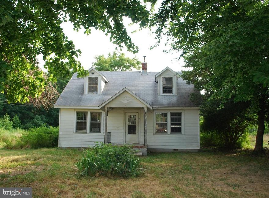 Located 10 minutes from the Naval Air Station PAX with no HOA fees, this is a prime 1.69 acre corner lot off MD-235/Three Notch Rd. The existing cape cod needs a complete renovation or can be used to help save fees on a new/replacement home. It is being sold strictly as-is including all personal items remaining in the home and on the property.  Seller will not make any repairs.  County records show the property has a deep drilled well.  The existing septic is not usable.  The property had a successful perc in 12/22 and has preliminary county authorization for a standard septic system.  SMECO has plans to convert overhead electrical wires on the street to underground.  The buyer will need to confirm those plans and overall project status directly with SMECO.  There is a partial basement that is fully flooded and inaccessible.  There are additional structures on the property conveying as-is including a barn.  Agent/Owner.